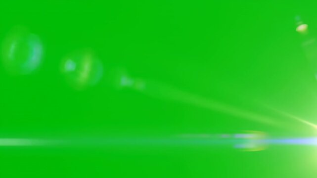 A fast-moving optical flare zapping and streaking across a solid green screen, creating a dynamic light effect glow, bright, rapid