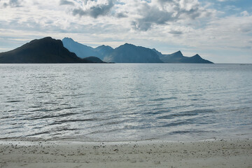 Silhouette view of mountain coast with ocean horizon and beach
