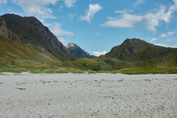 Serene coastal landscape with mountain backdrop