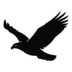 Obraz premium Majestic black silhouette of a soaring eagle with wings extended in flight silhouette