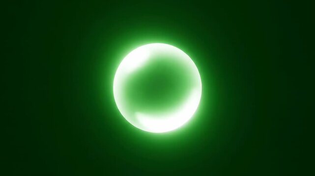 A mysterious glowing orb flickers into existence and fades away, isolated on a solid green background transition, light effect, ethereal