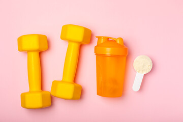Protein shake with protein powder on a colored background. The powder is mixed with water or milk. A dietary supplement for a balanced diet. Whey protein. Fitness and gym diet nutrition.