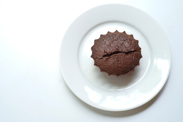 Cup cake of lava chocolate cake on white dish