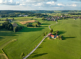 aerial photo of a tranquil landscape with meadows pastures and forests in the Wuerttemberg Allgaeu, Baden-Wuerttemberg, Germany © Uwe