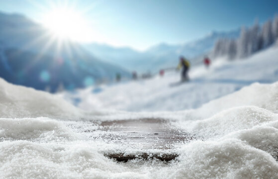 Snow covered copy space for product placement and snowy mountain landscape in the heart of winter, with tree-covered slopes and frosty pine forests under  bright winter sky.