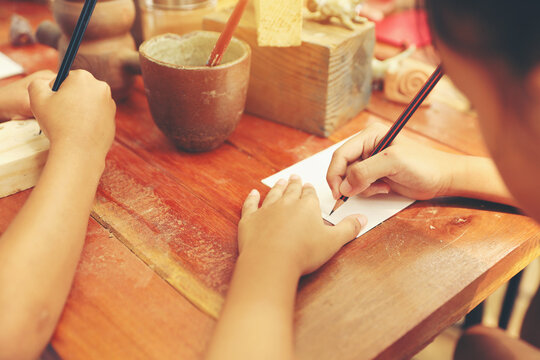 Kids Drawing and Having Fun Together. Art Workshop for Young Students