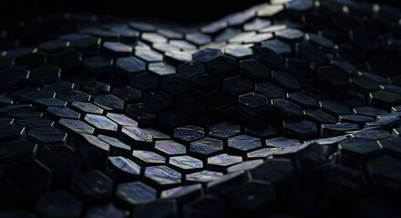 Fototapeta premium Abstract Black Hexagonal Pattern with Iridescent Shine in Dark Lighting