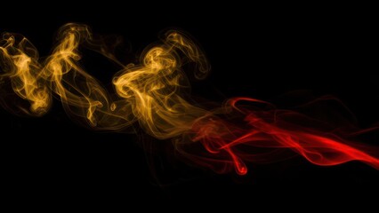 Obraz premium Abstract smoke patterns in shades of gold and red against a black background