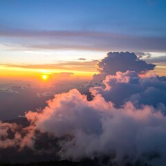 Majestic sunset above clouds
