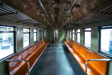 vintage train wagon interior with perspective view, retro carriage in classic design and cozy aged ambiance