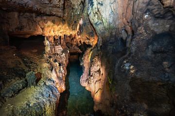 Underground river inside limestone cave