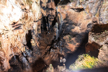 Cave formations with moss vegetation