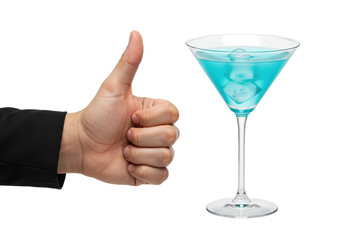 Isolated hand giving thumbs up beside a martini glass filled with turquoise liquid drink