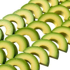 Fresh avocado slices arranged in a pattern isolated on transparent background