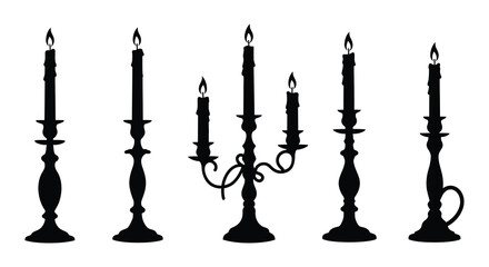 Naklejka premium Elegant black candlestick arrangement displaying a striking dark silhouette