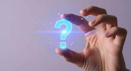 Futuristic concept with a hand holding a glowing digital question mark, representing online support, problem-solving, and finding answers