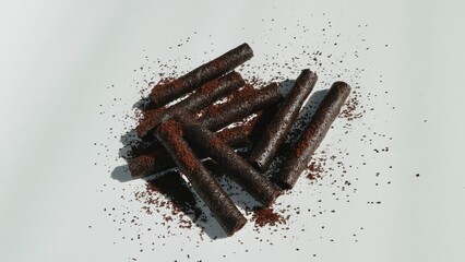 An attractive aesthetic photo of chocolate rolls with a white background.