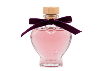 Isolated heart shaped bottle with pink liquid, tied with a decorative purple velvet bow knot