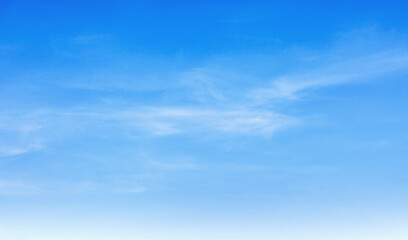 clear blue sky with  clouds