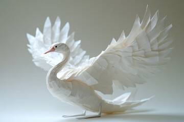 A white bird made out of paper.