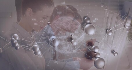 Collaborating three researchers analyzing molecular models on tablet at lab, with screen overlay