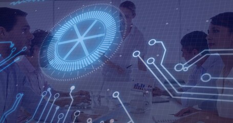 Collaborating team wearing suits analyzing data at conference table, with holographic interface