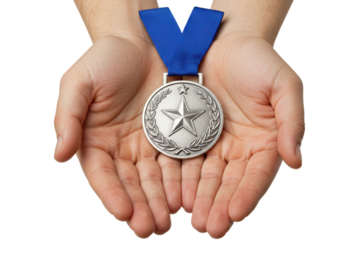 Isolated hands holding silver medal with blue ribbon, symbol of achievement or success