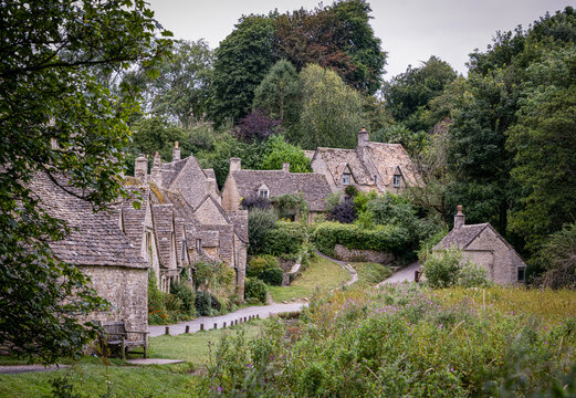 Quaint stone cottages of Bibury village in the Cotswolds, England
