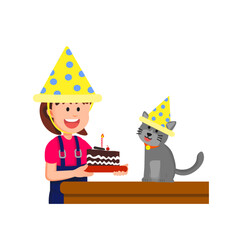 A little girl giving a birthday cake to her cat wearing party hats