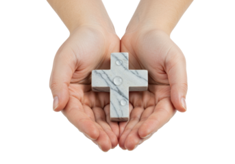 Isolated marble cross resting in cupped human hands offering hope spirituality faith