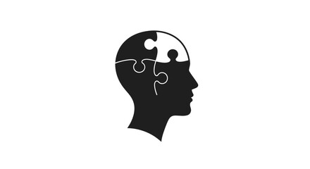 Human head silhouette with puzzle pieces representing mind and thought processes.