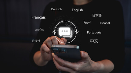 A person holds a smartphone displaying multilingual communication options, symbolizing global connectivity through language.