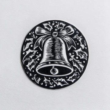 Monochrome Christmas Bell Ornament with Holly and Ribbon.