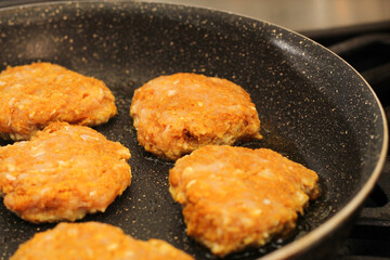 Chicken Kofta Patties Cooking on Hot Skillet