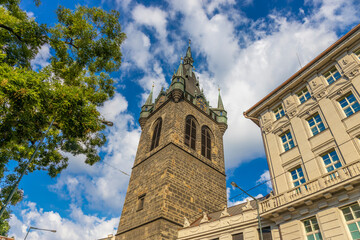 Prague cityscape, the capital of Czech Republic tourist sights. Prague historic center district at Charles bridge during the day. Busy tourist area city sights of Prague, capital of Czech