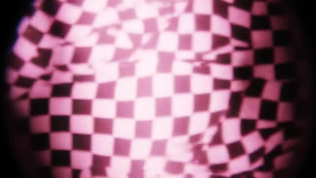 Checkered pattern distorted through rounded lens