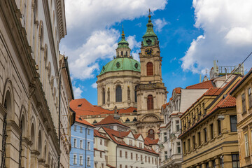 Prague cityscape, the capital of Czech Republic tourist sights. Prague historic center district at Charles bridge during the day. Busy tourist area city sights of Prague, capital of Czech