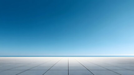 Expansive Tiled Rooftop Terrace Overlooking a Calm Sea and Vast Blue Sky.