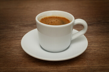 Close-up side shot of Turkish coffee with frothy foam