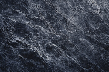 Dark gray stone texture with white veining natural background