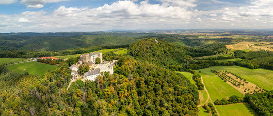 Buchlov a royal castle on a wooded hill aerial view, Czech republic