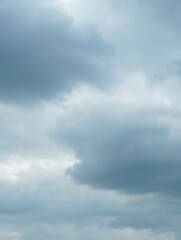 Fototapeta premium The vast expanse of the sky is filled with dramatic gray clouds creating a sense of foreboding atmospheric beauty and natural wonder above.
