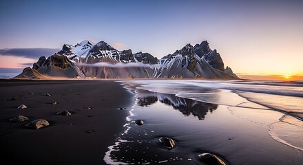 Stokksnes Mountain Range Reflection on Black Sand Beach at Sunset.