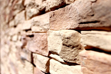 Stone wall texture close-up
Detailed close-up of a decorative stone wall with natural colors and textures. Perfect for use as a background, design element, or architectural concept.
