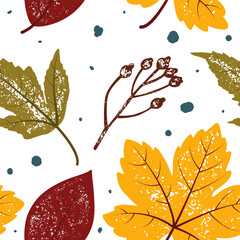 Seamless vector pattern with colored fall leaves and bunches. Bright autumn design