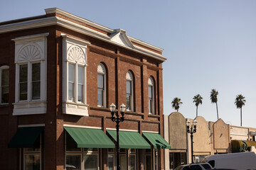 Antique wrought iron street lights decorate historic downtown Selma, California, USA.
