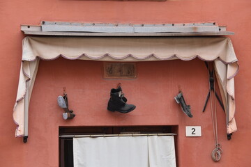 old wooden window with a shovel