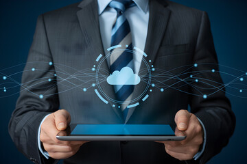 Businessman holding tablet displaying cloud computing technology and network connections concept