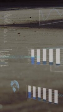 Animation of graphs, globes and computer language over low section of people walking on street