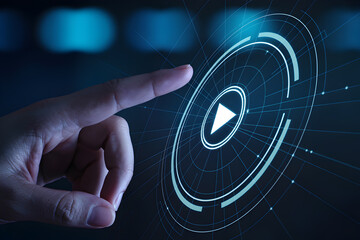 Finger touches play button on futuristic interface with glowing lines and circles in a digital design